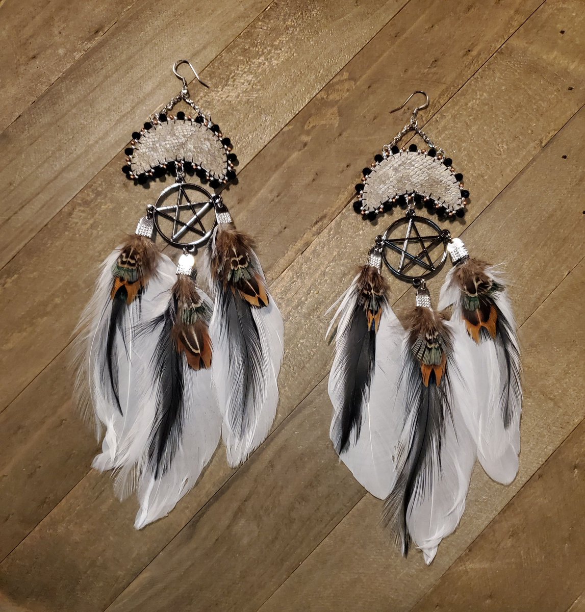 Salmon skin moon, pentacles, and feathers beaded earrings, available in my Big Cartel store @ lovealaskadesign.bigcartel.com, kukwstumckacw- thank you for looking! #NativeTwitter #beadwork #GothTwitter #PaganTwitter #NativeMade #BeadedEarrings