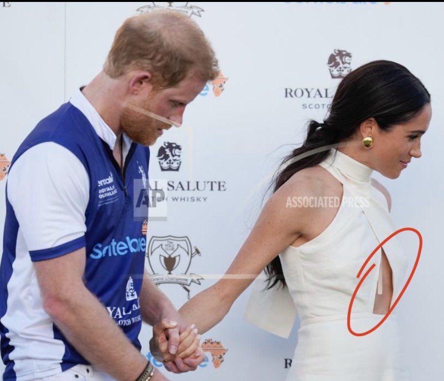 How fucking defeated does Harry look in this pic?? “Yes Mummy, OK mummy.” As Megs drags him about during HIS polo match. But of course she had to make it all about her. #MeghanandHarry #MeghanMarkleAmericanPsycho #MeghanandHarryAreAJoke #MeghanandHarryareGrifters