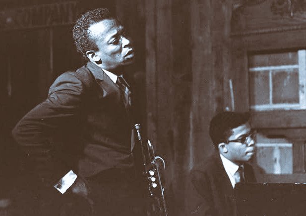 Miles Davis and Herbie Hancock Photo by Chester Sheard