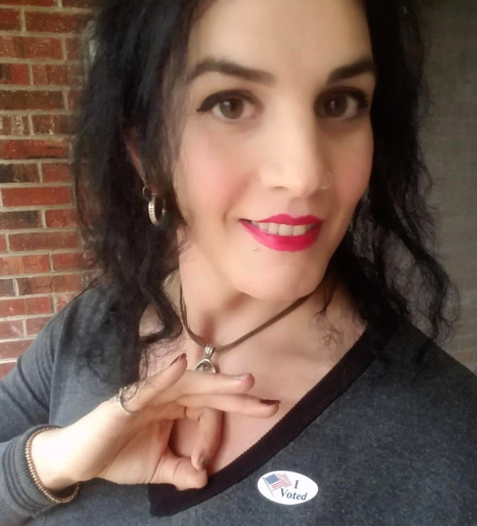 I thought the many fans of Vanessa Holguin would like to see our good Christian friend flashing the 'white power' sign after voting. Isn't she delightful?