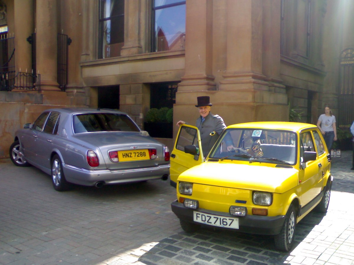 I love this photo of my old 126. As it's an unexceptional car parked at a posh hotel's entrance beside the hotel's Bentley. Also the the concierge who collected it for me has such a big grin on his face. #Maluch