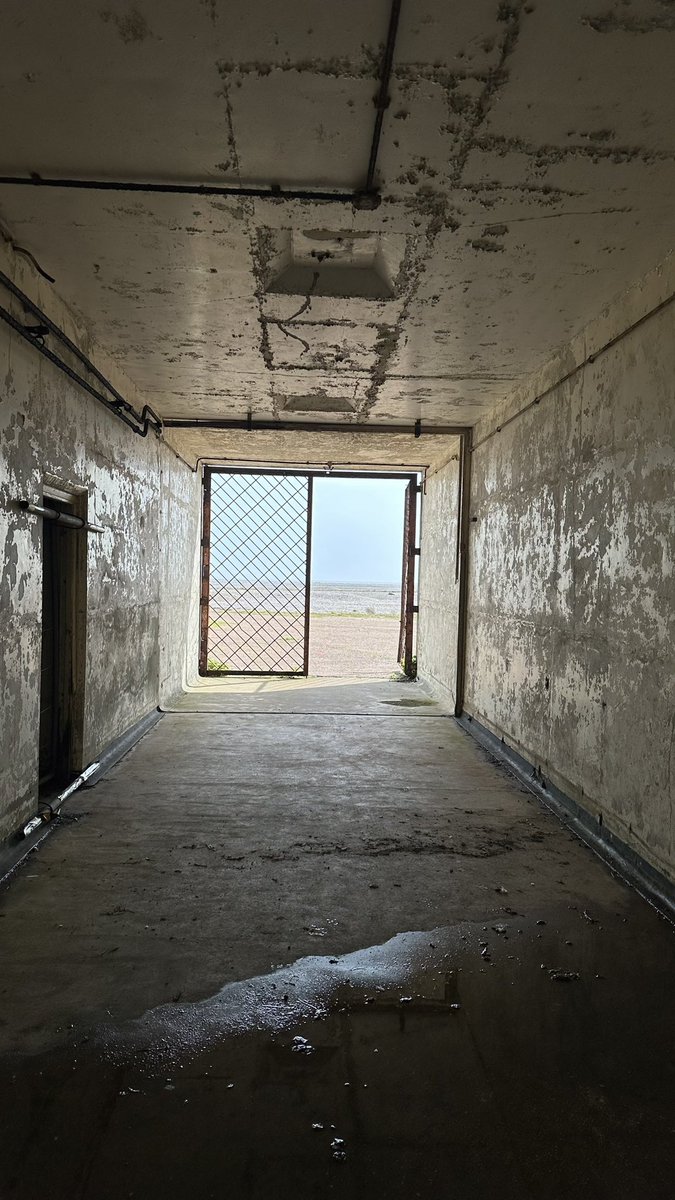 Standing inside Laboratory 1, one of six atomic weapons test cells at Orford Ness, looking out over the shingle to the sea. It’s an odd place but a real jewel of the @nationaltrust