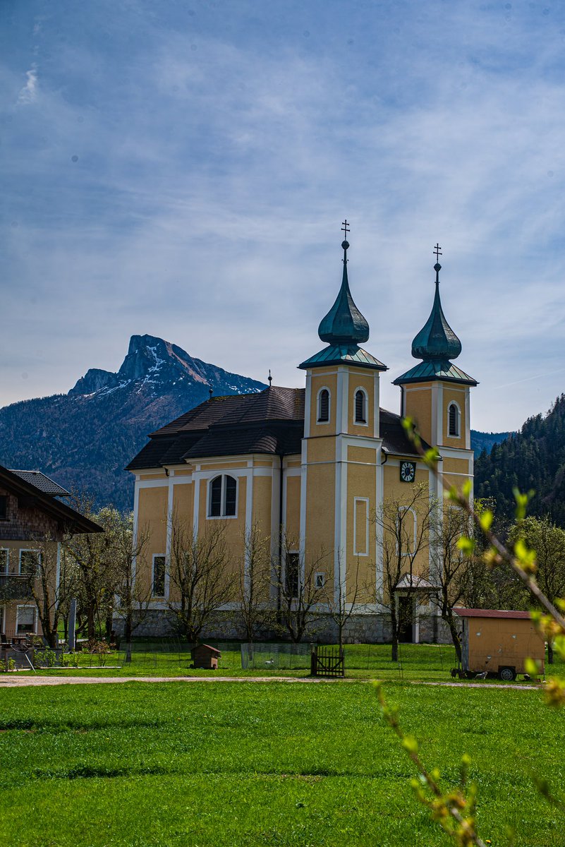 #church #churches #steeple 
Church of St Laurentius in St. Lorenz, Upper Austria, for you and for #SteepleSaturday . The mountain in the background is Schafberg. Yes, my camera urgently needs some service!