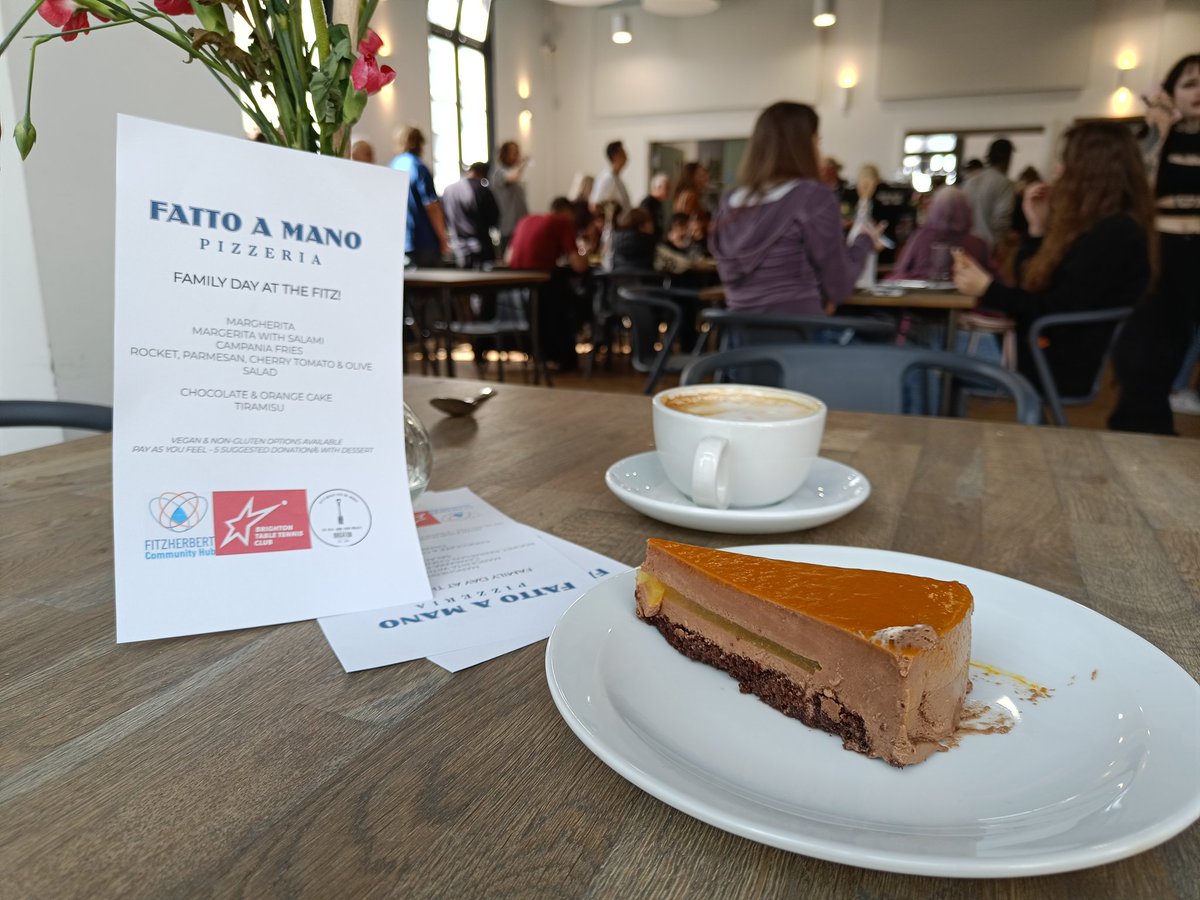Great pizza & vibe at @FitzherbertHub family day - not forgetting yummy choc & orange cake! #Kemptown is so lucky to have @realjunkfoodBri #PayAsYouFeel cafe & @BTTCOfficial running an amazing inclusive #TableTennis club. Thanks @fattoamanopizza for food (only till 4, so hurry!)