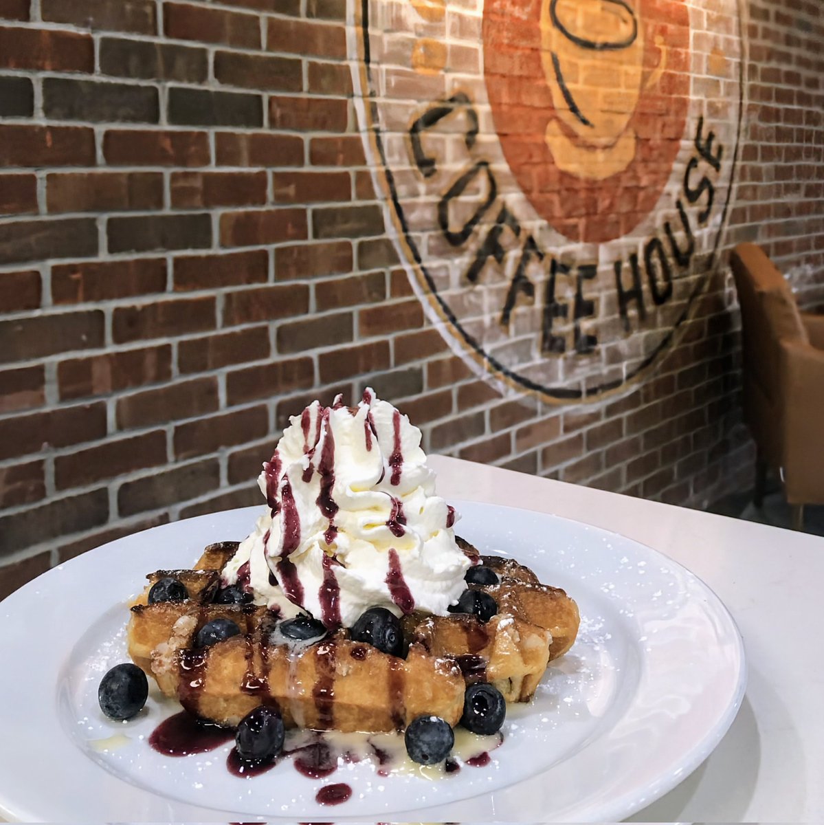 You need our Blueberry Cheesecake Waffle in your life! This weekend special includes a Belgian waffle topped with powdered sugar, blueberries, cream cheese icing, whipped cream and blueberry drizzle. 🫐