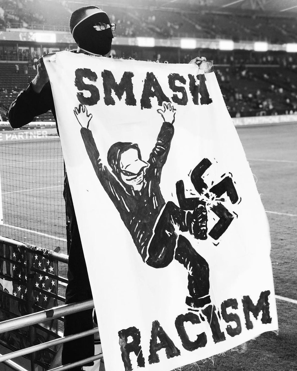 We, at One Two Threads and @ACBrigade, stand with Joseph Paintsil. As a show of solidarity, we are re-releasing the Smash Racism shirt that is based on the banner that has been in 121 for many years. All profits will be donated to the @EASTSIDERIDERS in LA. Shirt link in our bio.