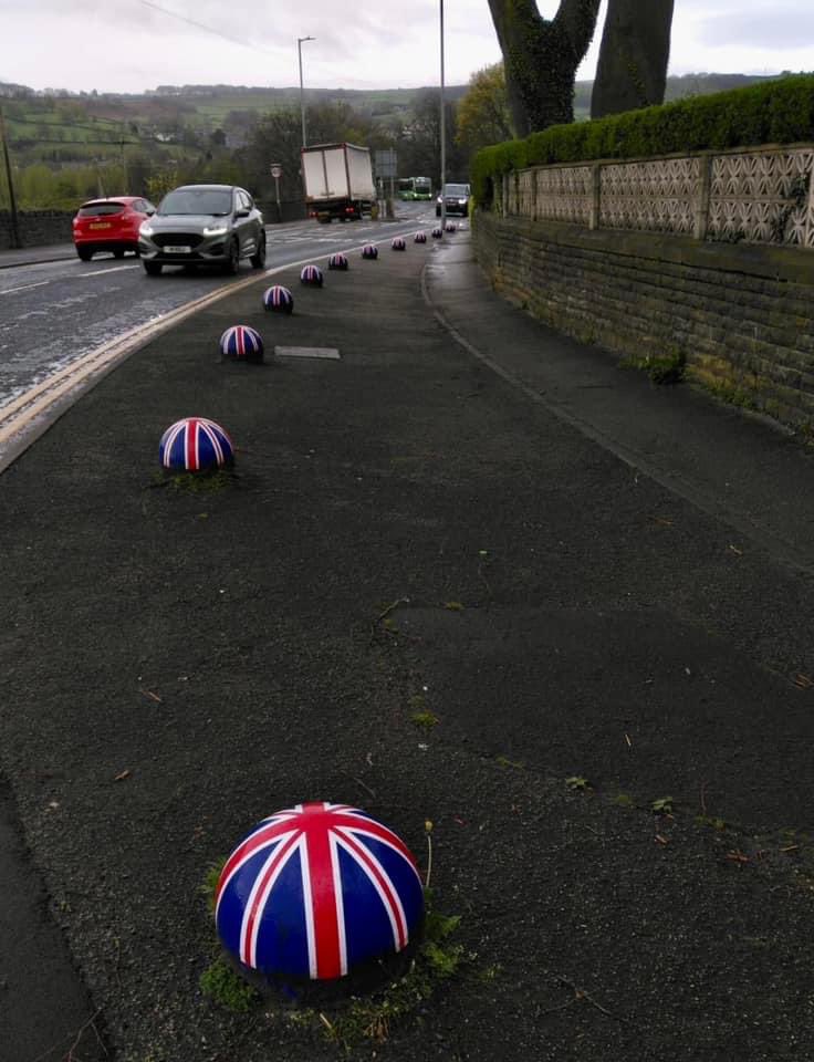 How much better does this look? Someone in Yorkshire painted union flags on bollards to brighten the area.