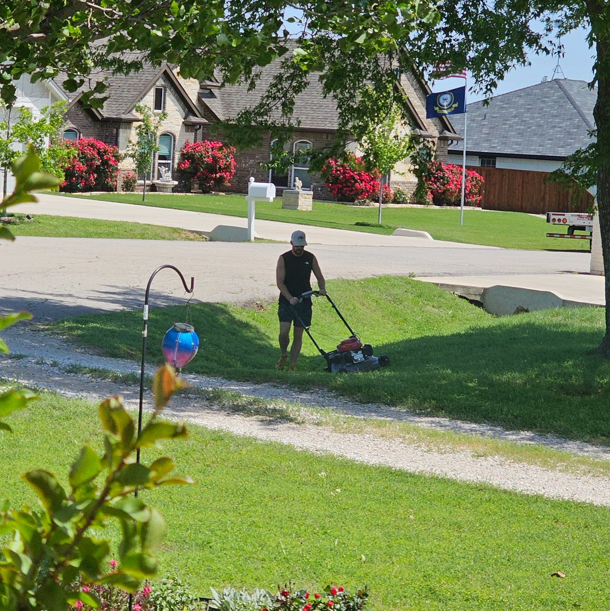 Me and my neighbor have this unspoken act of kindness that we do for each other, where whoever is mowing their lawn, mows the others ditch. We've never spoken about it, but we've been doing it for years. I think it's pretty cool. (That's him mowing the ditch on my side)
