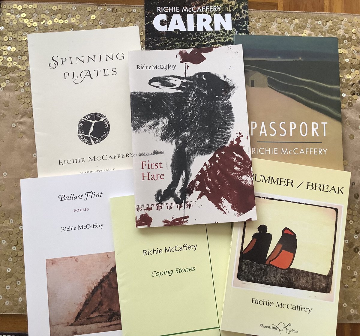 strokingtheair's tweet photo. A genuine and impressive talent, a poet who never fails to impress. The constant rain has me picking up my favourite books, all of these are favourites. @MccafferyRichie https://t.co/w1FnH3ZIHD