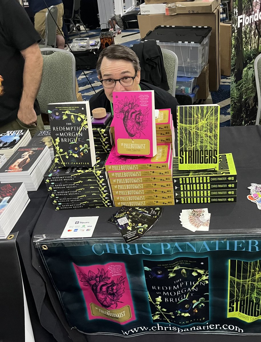 Are my books scary? Look how terrified I am! Come by and console me by purchasing one and getting them out of my space! #AuthorCon #scaresthatcare