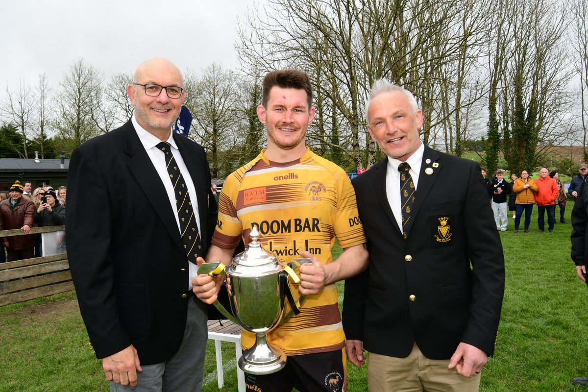 Wadebridge Camels skipper Adam Blackmore receives the Tribute Cornwall Cup from CRFU Andy Reed and Lee Maher. Final score Camels 23 v Truro 15. @camelsRFC @swsportsnews @pastitref @Cornwallrugby @ruckinred