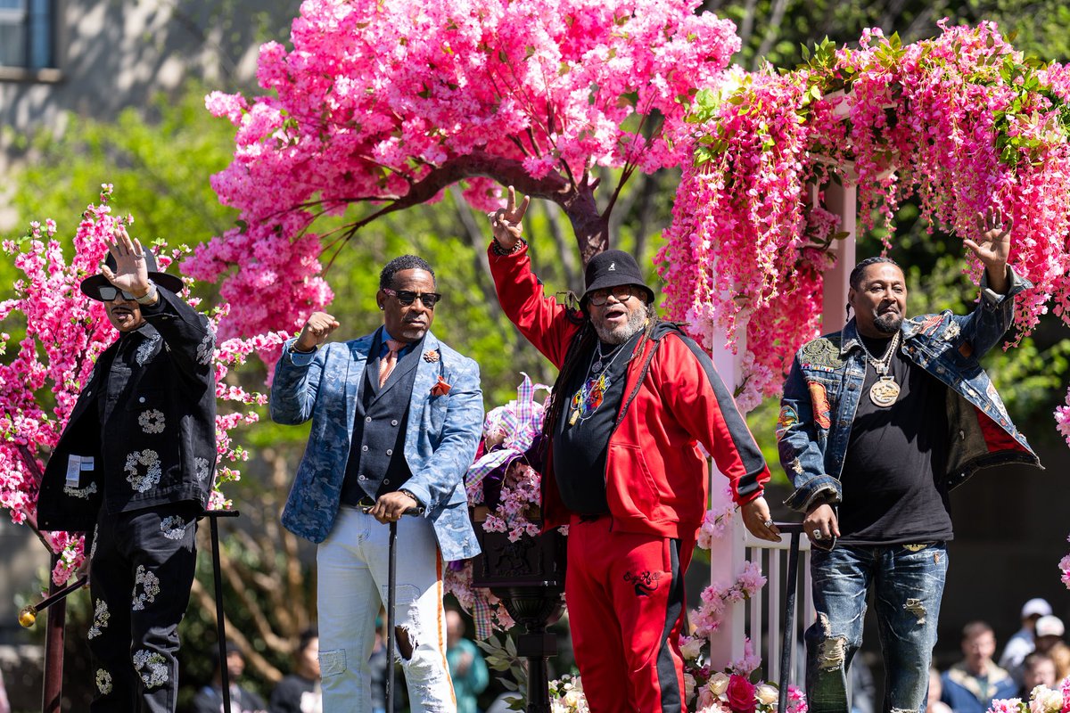 The Sugarhill Gang waves to the crowd during the Cherry Blossom Festival Parade on Constitution Ave