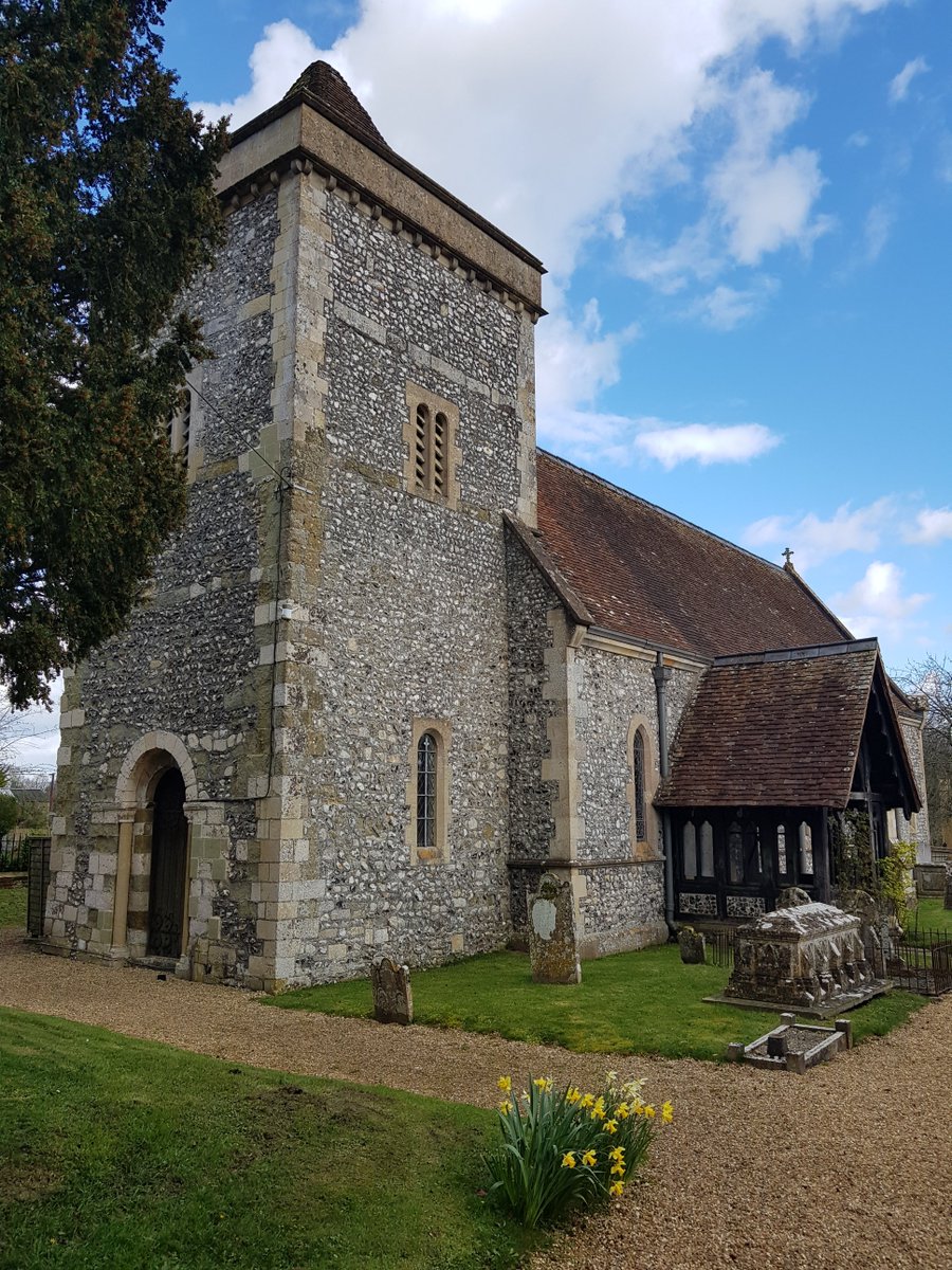 #FontsMeanFarewell was the starting pistol for a sprint back to the #Wiltshire #Avon to resume the #AvonScamper2024. Mouse finds herself in Wilsford at the Church of St. Michael. A little peek through the yew. #StMichaelWilsford sits under a watery spring sky. #SteepleSaturday