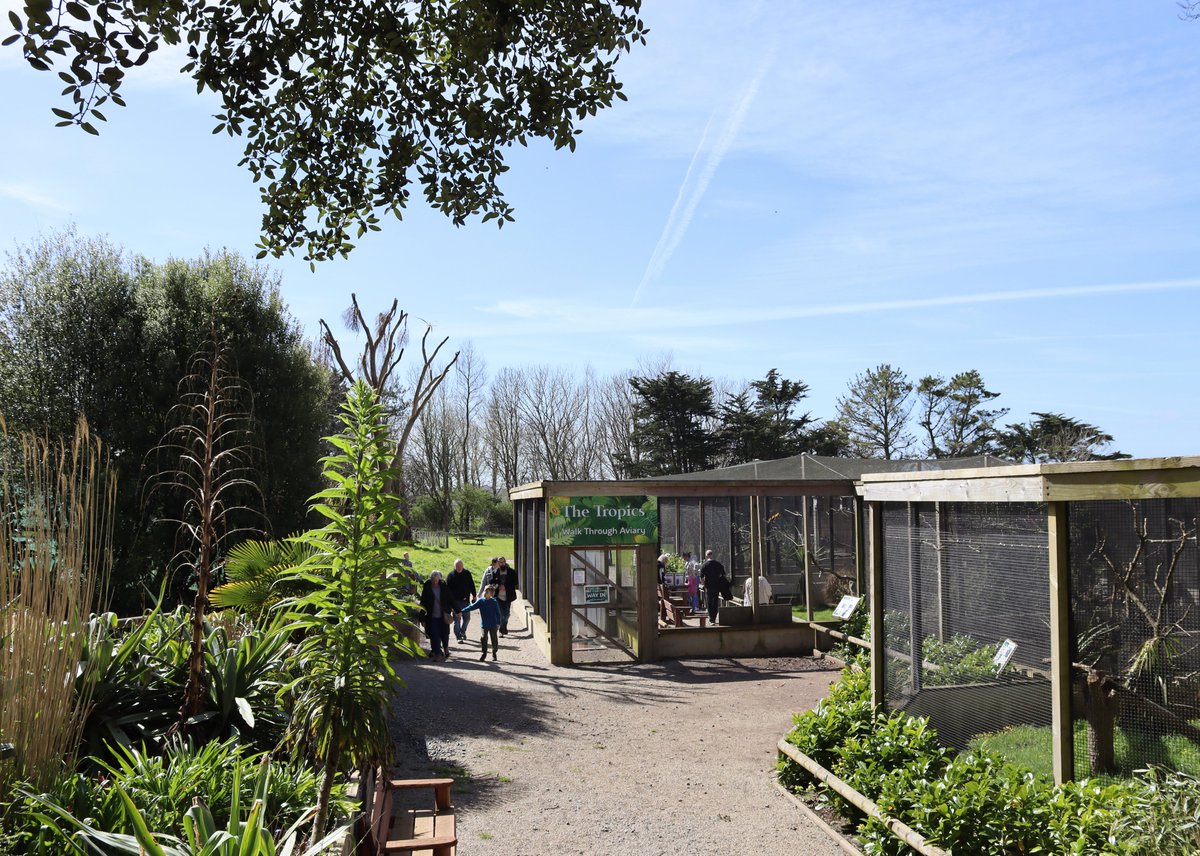 A lovely day for visitors exploring 'The Tropics' exhibit near the Woodland Walk and Fun Farm. Photograph By Michelle