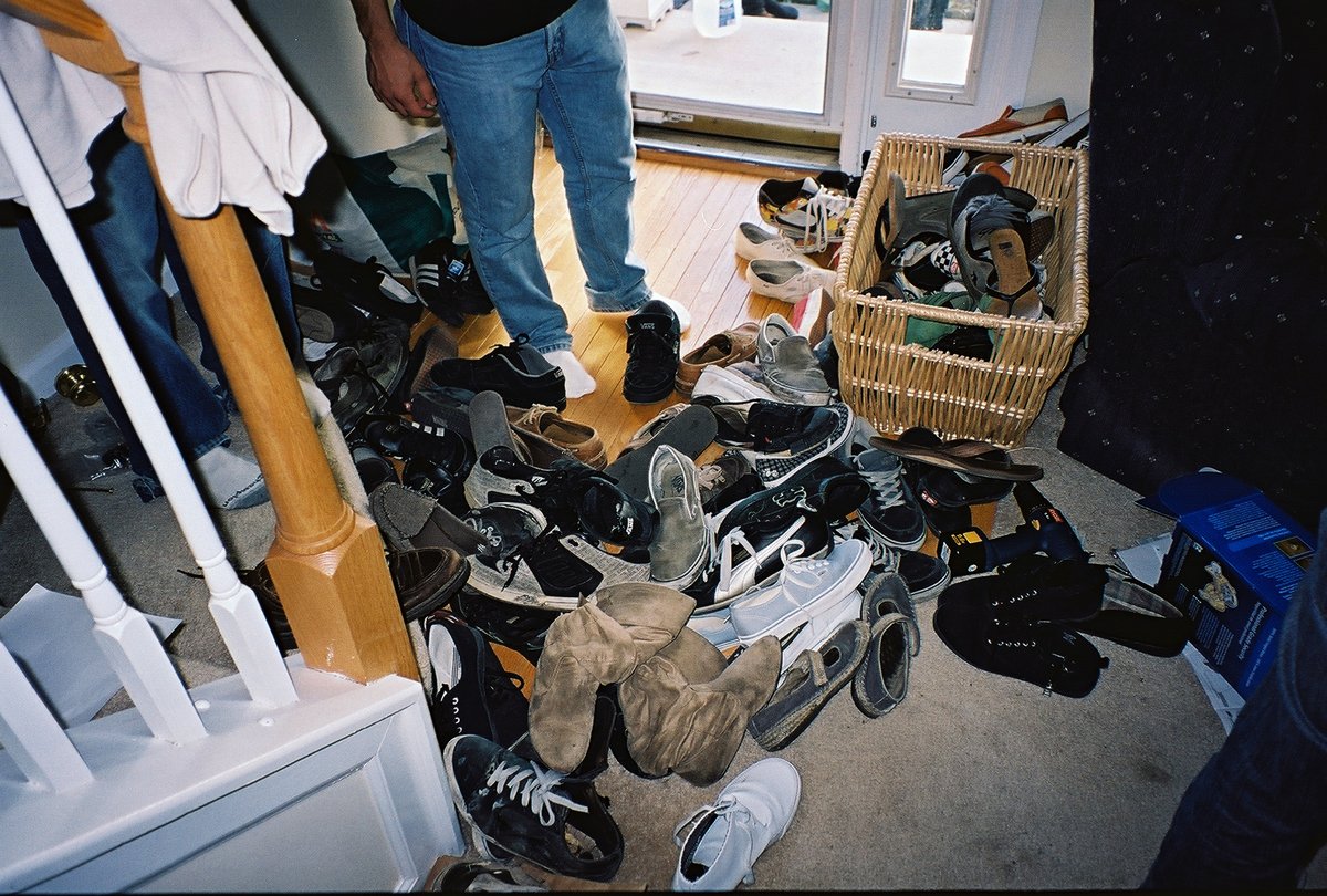 i took this photo at a house show i played in 2008(?). we all had to take off our shoes to enter. the venue was called krasner's basement.