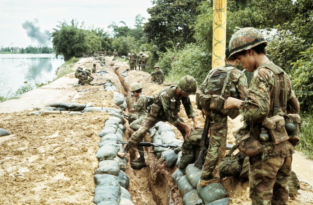 The Saigon army digs a trench along the My Hanh River, north of Hue in southern Vietnam, June 6, 1972. #ColdWar