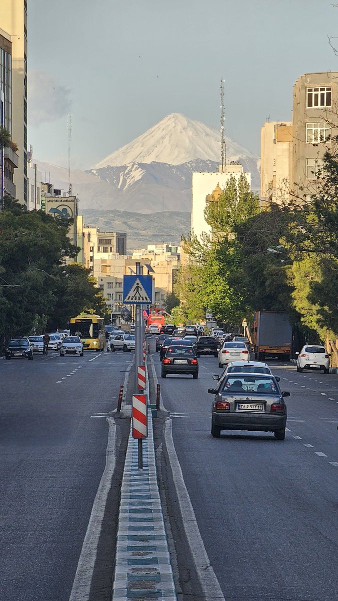 You can see the shining Mount Damavand even from #Tehran's Fatemi St. if there is no pollution 😍 📷@ashkanborouj