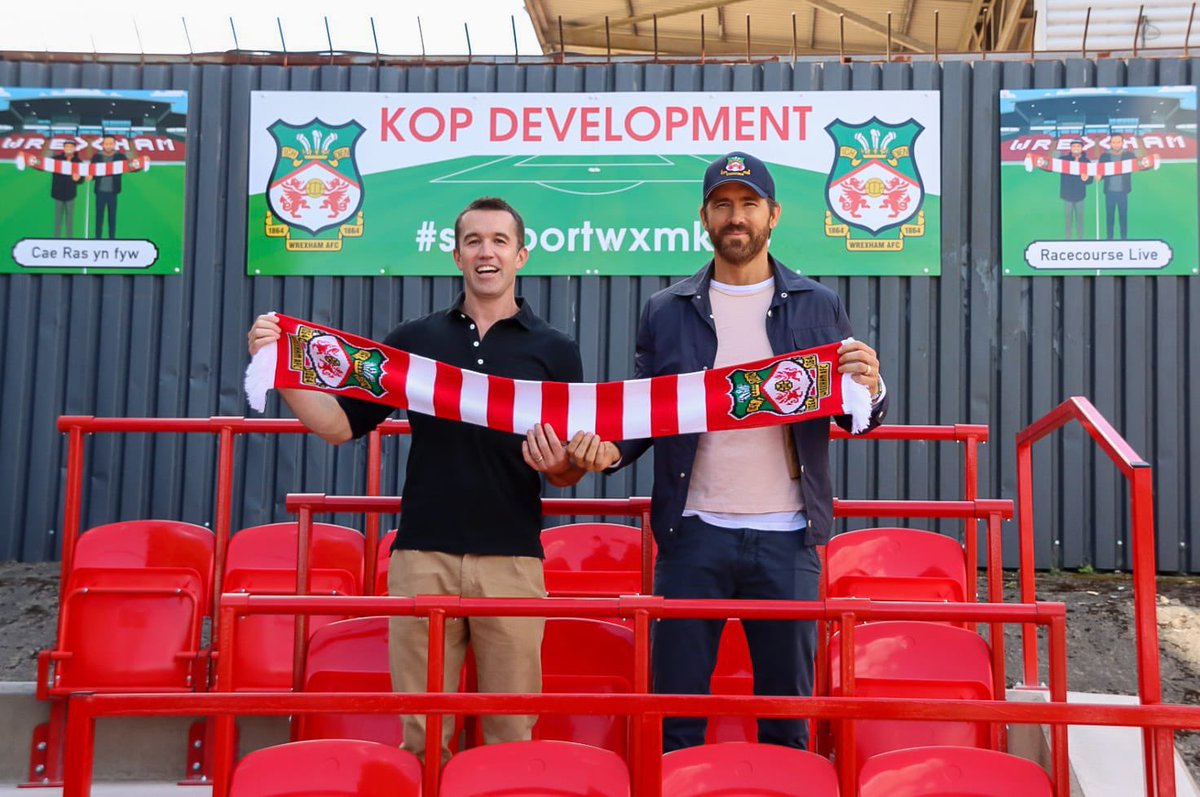 Congratulations to Wrexham on their promotion to League 1!!! I still pinch myself that I worked with the club on their ‘Racecourse Live’ promotions including creating the illustrations of owners @RMcElhenney and @VancityReynolds shown here in the background.