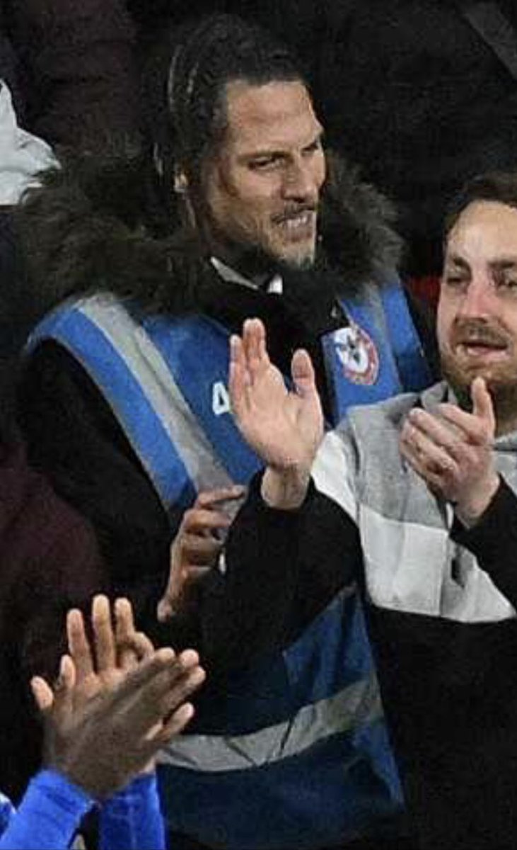 Well…. Isn’t this one of your STEWARDS at @BrentfordFC ? Making beheading gestures to Jewish protesters? Oh dear @MrAndyNgo