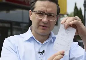 #NobodyLikesPierrePoilievre Pass It On Holding a grocery receipt for groceries he hasn’t paid for in 20 yrs Political parasite since 2004