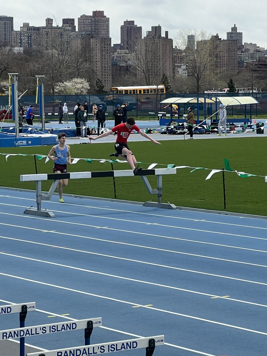 Junior Declan Butler completing in the steeple chase at Ichan Stadium .