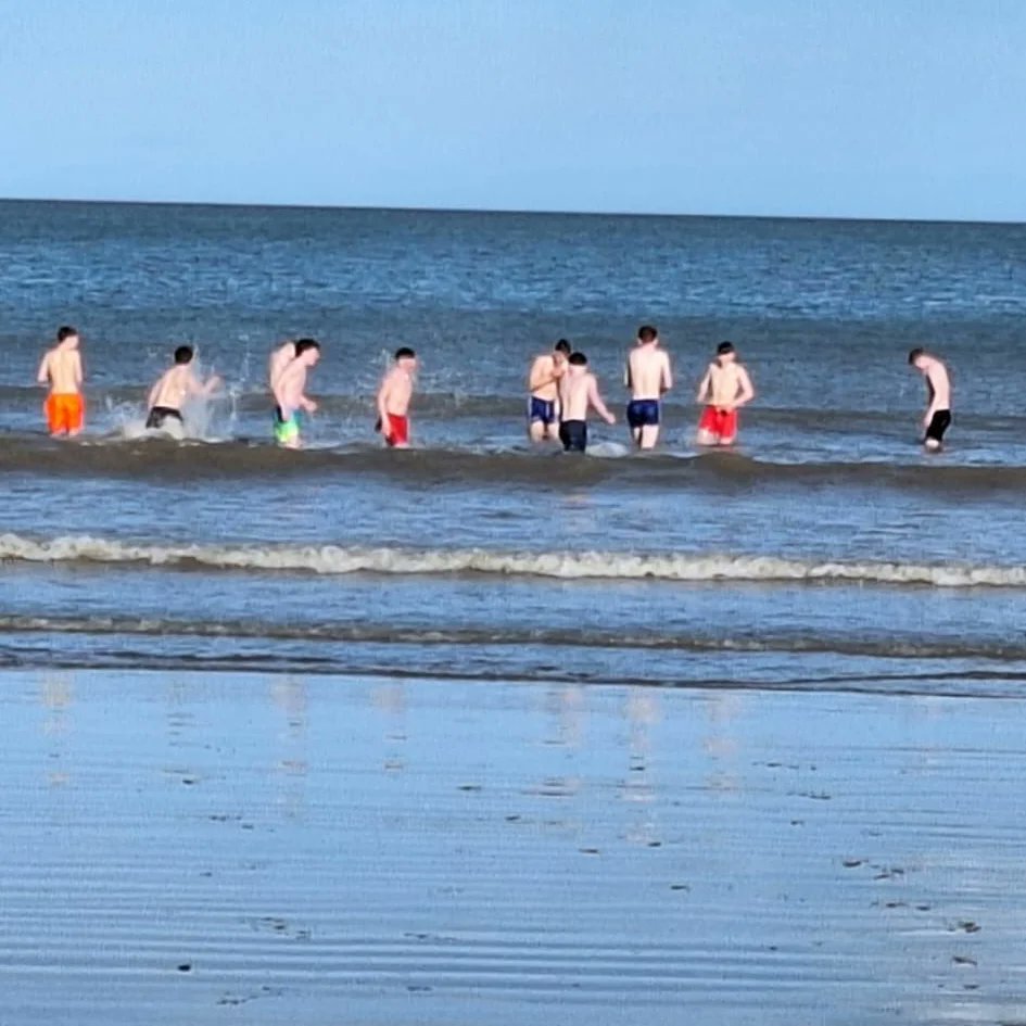 TSS U16 Boys having a dip in thesea in Portmarnock following a pulsating win away against St Sylvesters. 
Well done lads
