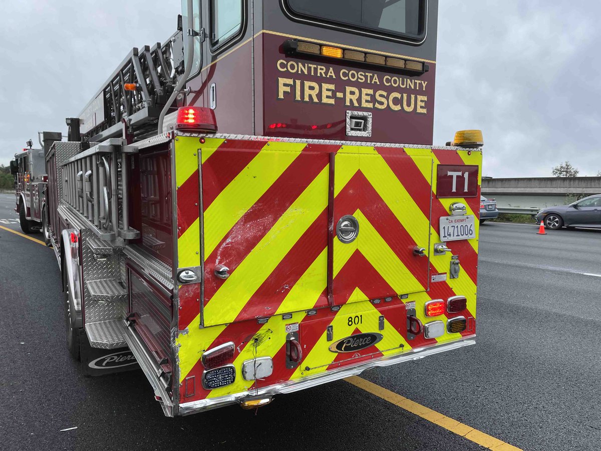 ContraCostaFire's tweet photo. Around 1000hr. Con Fire Truck 1 (T1) was blocking the # 1 lane for a Con Fire engine  working a previous accident. T1 was struck by a vehicle. 4 ff’s from T1 being evaluated at hospital.  Occupants of vehicle critically injured and transported to hospital. https://t.co/4OJd2V3Lca