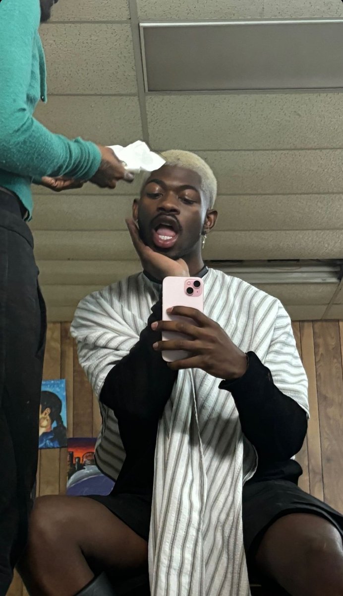 Lil Nas X with a new hairstyle via Instagram. 🔥