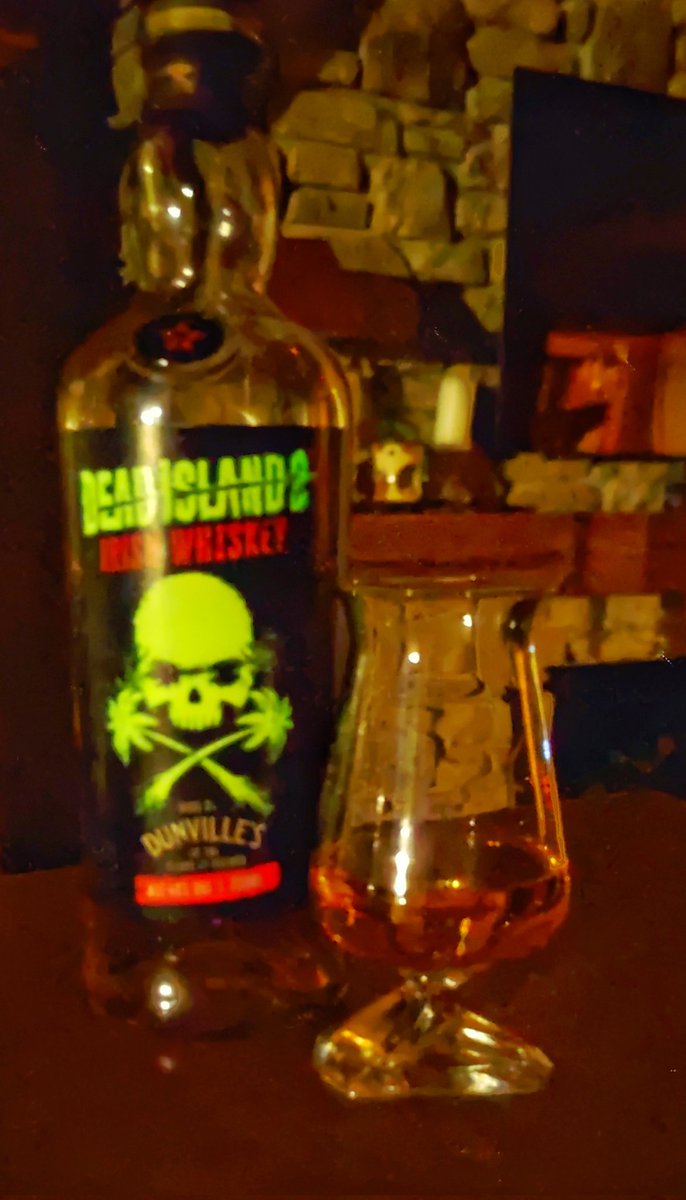 Photo taken in the dark, love the illuninous label on the <a href="/Echlinville/">Echlinville</a> , <a href="/DunvilleWhiskey/">Dunville's Irish Whiskey</a> Dead Island 2 release , Sláinte! #SaturdayNightSip