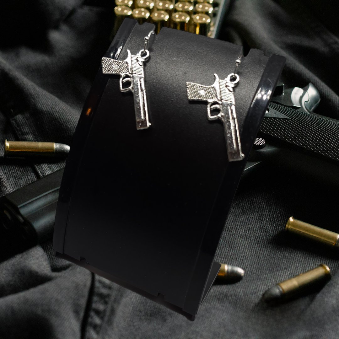 Make a statement with our stunning gun earrings from Moon Gems! 🔫 Perfect for adding a bold touch to any outfit. Handcrafted with care and attention to detail. Get yours now! #GunEarrings #FashionStatement #HandcraftedJewelry Shop here: [moongemsshop.etsy.com/listing/170021…]