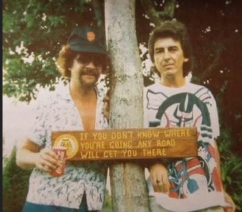So which came first? The lyrics to George Harrison’s song “Any Road”, or this sign George and Jeff Lynne are standing with?? #brainwashed #georgeharrison #lastalbum #jefflynne