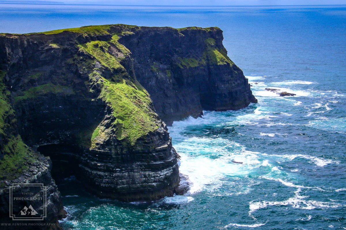 Beautiful blue water below the Cliffs of Moher. #cliffs #water #ireland #cliffsofmoher #waves #rocks #ruggedcoast #stripes #striations #landscape #amazingview #travel #photography @NiksImages @Traveliremag @travelireland @NationalGeoPicx