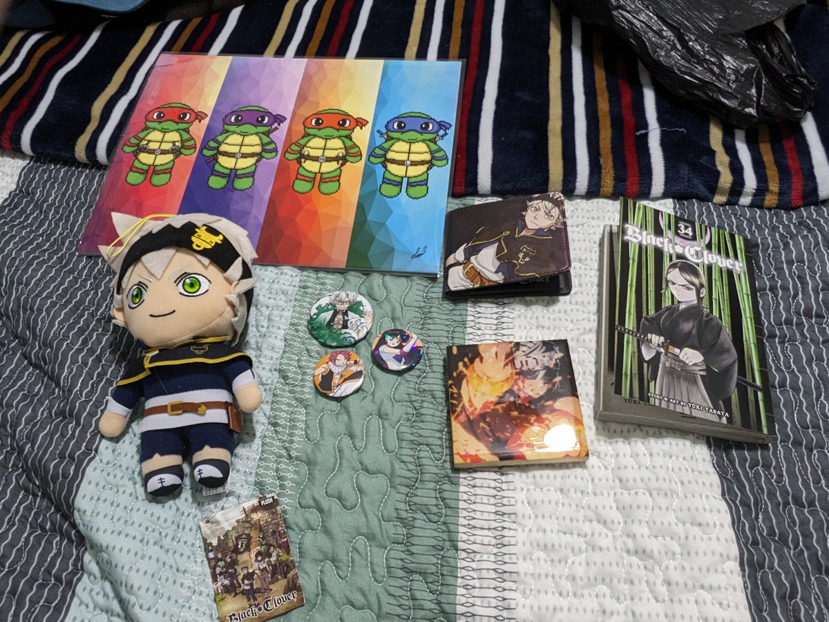 Officially done with Riverwalk Anime, Day 1!! Got to see the FT and Demon Slayer Panels, and got this haul!! - Asta Plushie - BC Volume 34 - Asta Wallet - Tengen Uzui Woodblock - Sanemi Shinazugawa Pin - Sailor Mars Pin - Natsu Pin - TMNT, FT, and Demon Slayer Prints