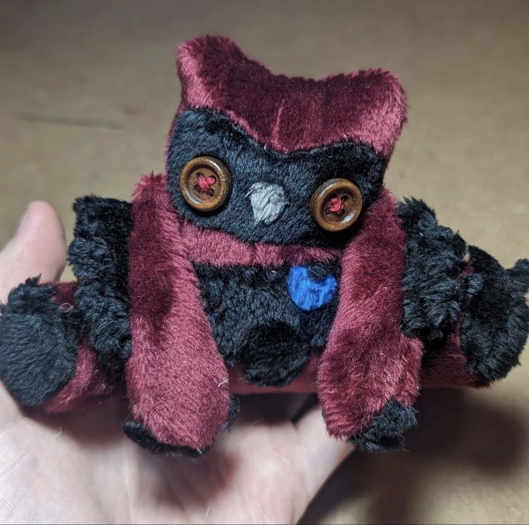 I also make owlbears as well! Here's my miniature Karlach Owlbear I made for myself. She was sewn a little crookedly, so it looks like she's cocking her head adorably!

<a href="/SamanthaBeart/">Samantha Béart is Darth Nul in Star Wars: TOR</a> #BG3 #Karlach #Owlbear #HandSewn #Handmade