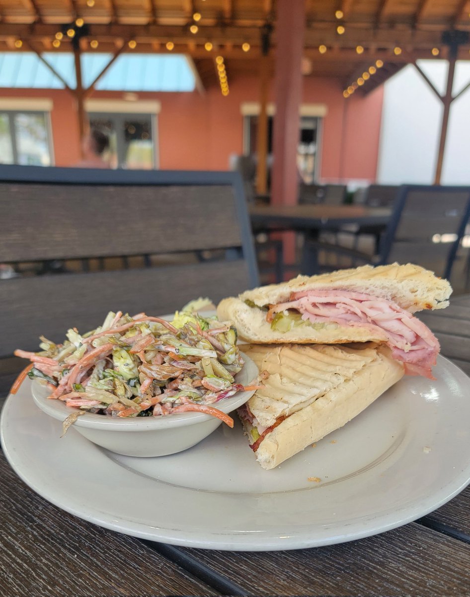 It's perfect patio weather today, so we're outside getting toastie with #SchlaflyBottleworks Ham & Turkey Toastie made with Swiss cheese, tomato, pickle, and dijonaisse on a pressed hoagie with a side of our signature cole slaw. Hits the spot!