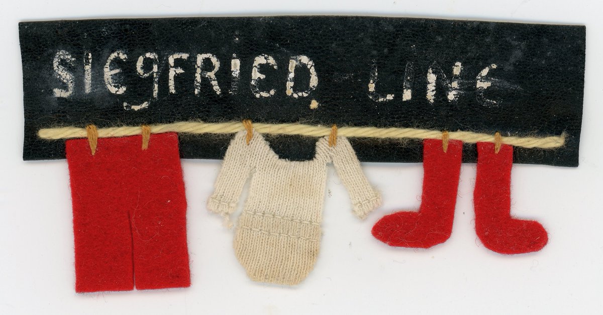 Early #WW2 homefront cloth lapel badge: the washing on the Siegfried Line; probably from the 'Phoney War' period in the UK. #SWW