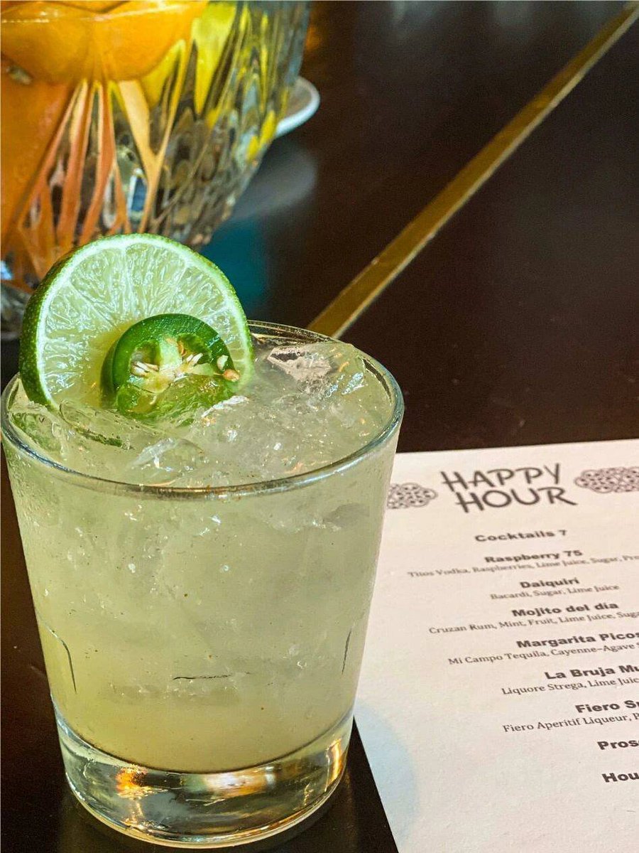 A cup of original mojito filled with sugar and mint leaves is really immersive.