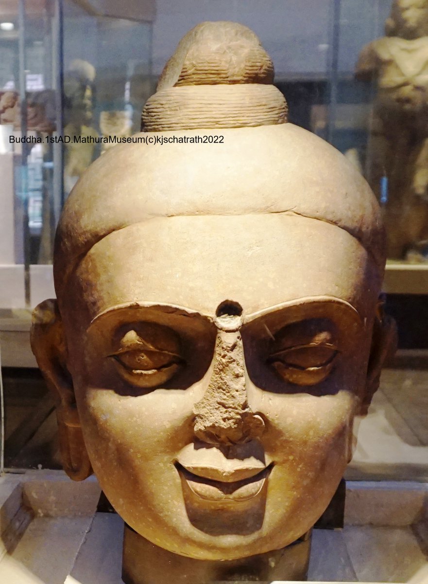 Buddha 1st Century A.D. Found at  Chaubara Teela, Mathura Height 57 cm. Has characteristics of Kushana period - shaven head round almond shaped open eyes small ear lobes smiling expression a round hole in its forehead #Buddha #1stAD #MathuraMuseum
#kjschatrath