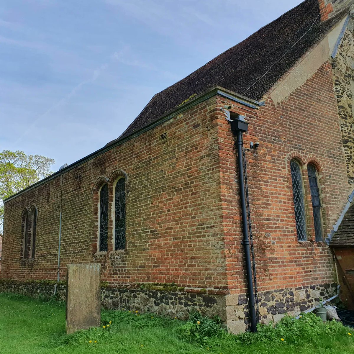 Surviving Jacobean box pews in the 17th century brick extension of St Peter's, Igtham.