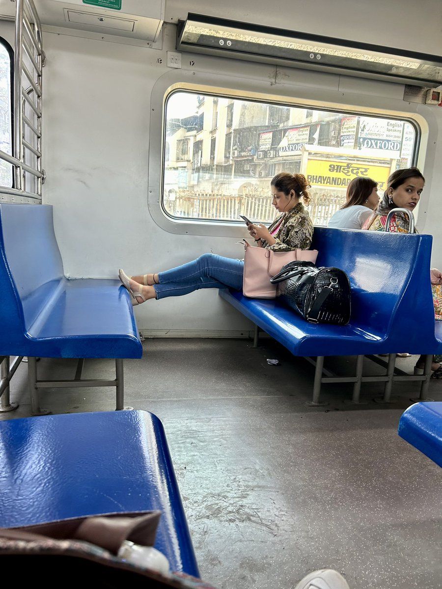 JustB_U's tweet photo. @WesternRly  here is my concern!  When educated #females lack basic sense! “You mind your business, Will sit like this with shoes” tumko kya? https://t.co/H4c27zaXbm