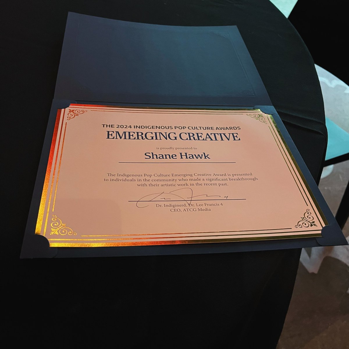 shanehawkk's tweet photo. Just received a 2024 I-POP Award for Emerging Creative! So grateful for the community that voted and gifted me this amazing award. The medallion is silver and made by silversmith Charley Johnson (Mvskoke/Chickasaw). Thank you, @leefrancisIV and everyone involved in #IndigiPopX https://t.co/itdaxSdjF3