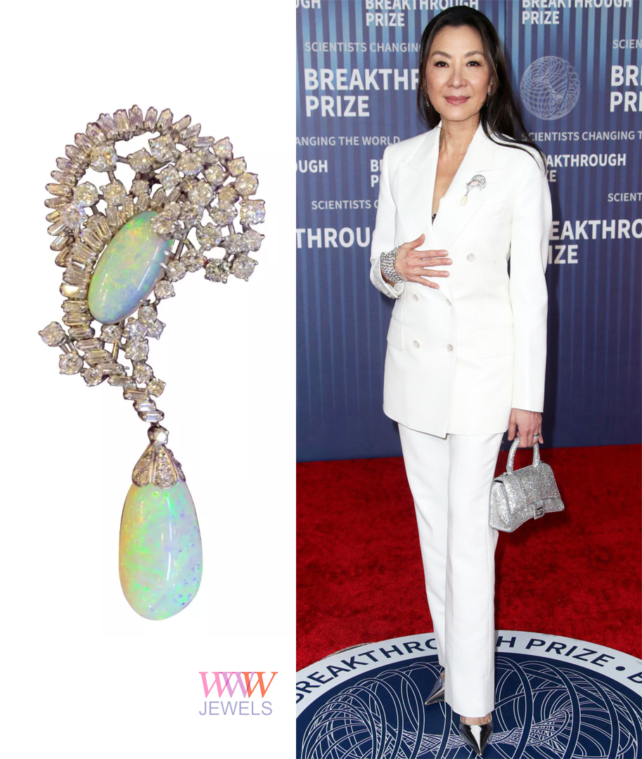 #MichelleYeoh rocked a $25.6K opal and diamond drop brooch from Joseph Saidian & Sons at the #breakthroughprize Ceremony. One opal's a hefty 26.32 carats, the other a 'mere' 6 carats. Bling level: off the charts!