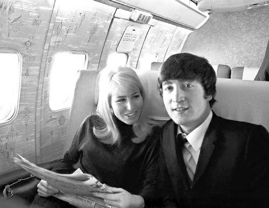 Cynthia Lennon and John Lennon on their way to experience the American Beatlemania for the first time