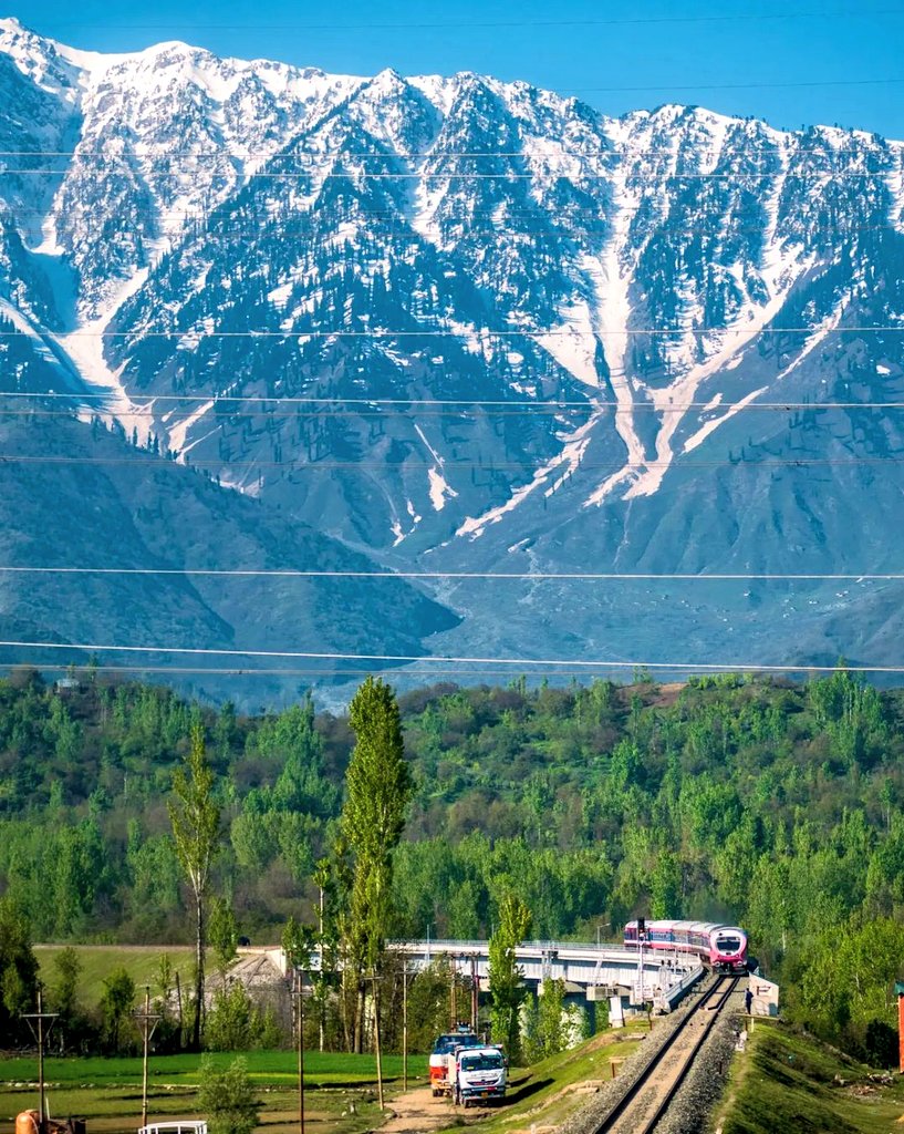 Today's #railway #photo - one of the most beautiful locations on the Kashmir valley line as a DEMU negotiates a curve near Qazigund railway station in the jurisdiction of @drm_fzr in @RailwayNorthern! Pic courtesy, Saurabh! #IndianRailways #trains #photography @SrinagarGirl
