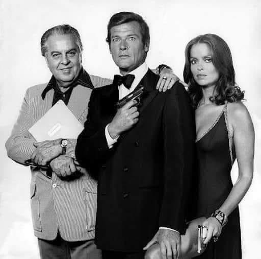 A publicity photograph of Albert R. Broccoli, Roger Moore and Barbara Bach for the #JamesBond film #TheSpyWhoLovedMe @70sFilm