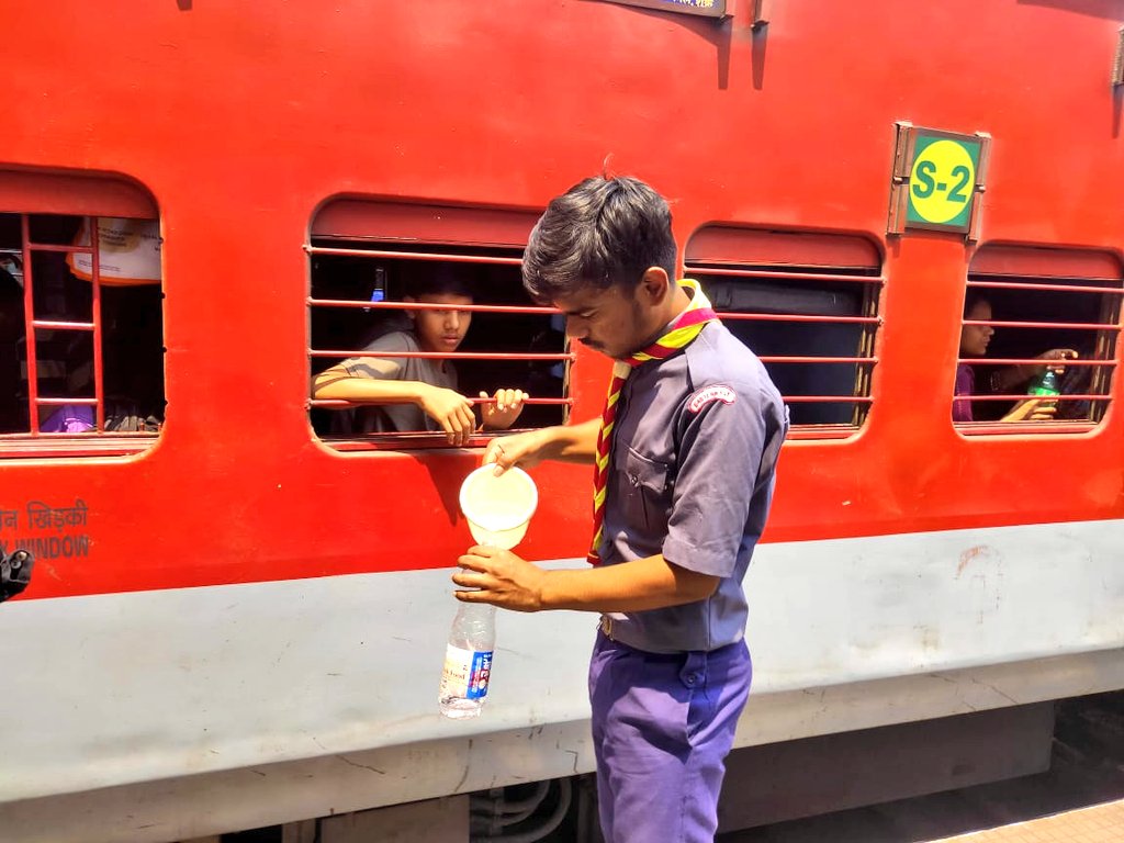 Drinking Water Service is being carried out at Asansol Station for the Passengers in Stopping Trains by the Members of The Bharat Scouts and Guides of Asansol District.