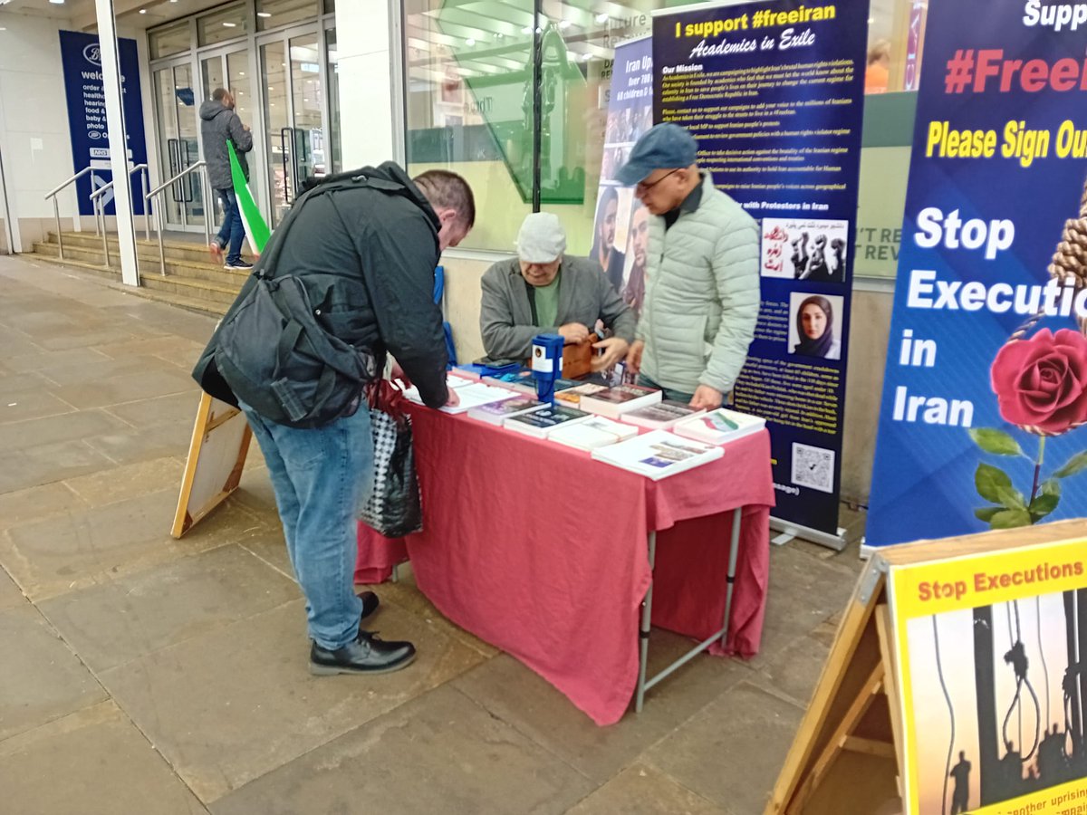 1-#Manchester—April 13, 2024: Freedom-loving Iranians, academics living in #England supporting of the #MEK organized a book exhibition, & petition collection in support of the #IranRevolution, political prisoners & to stop torture & executions. #NoImpunity4Mullahs #FreeIran2024