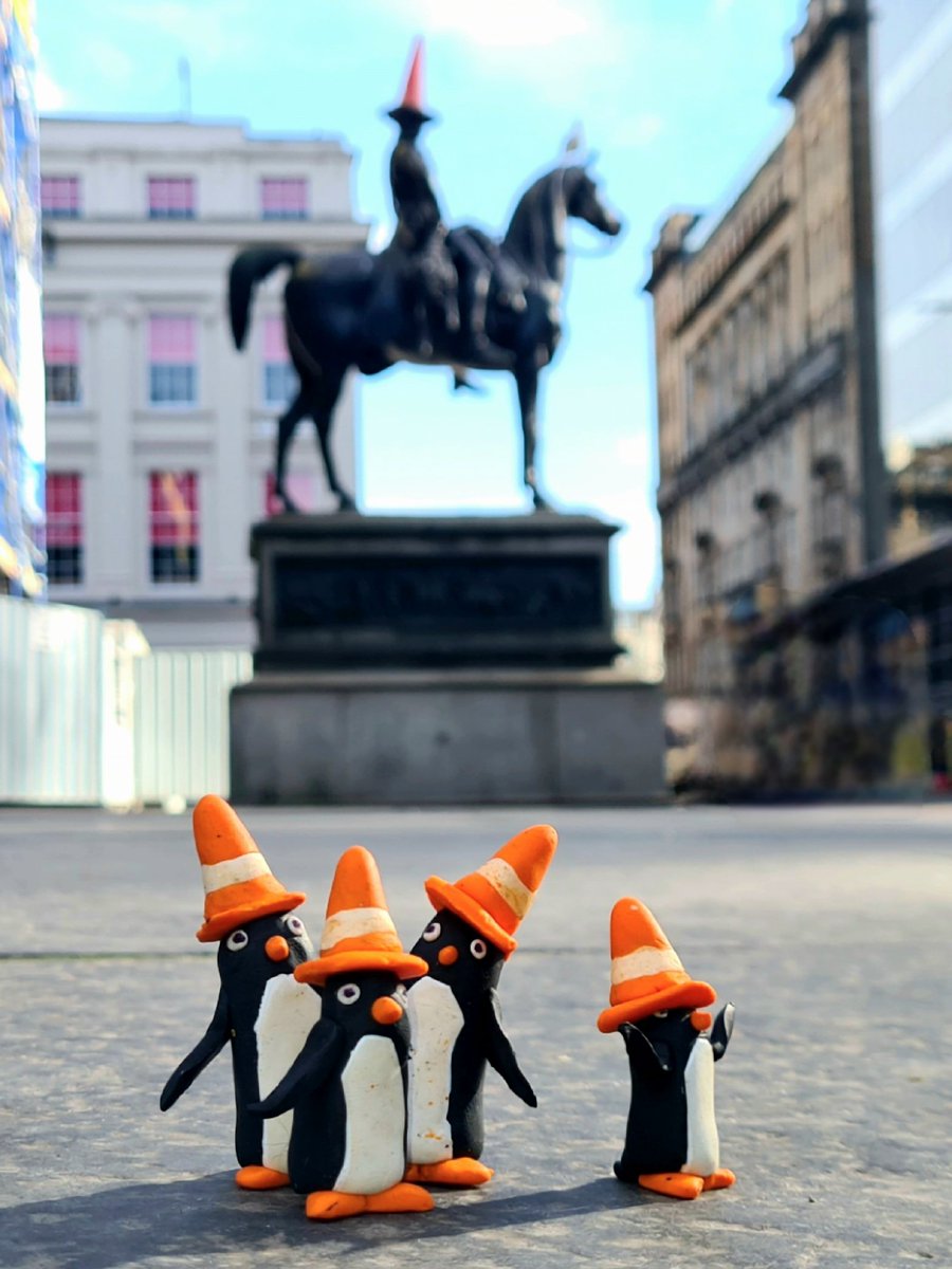 As it was a sunny start to today, we decided to get up early and do some sightseeing around Glasgow. This guy had a traffic cone on his head, so we thought we'd wear them too! #glasgow #roadcone #dukeofwellington #visitglasgow #penguin #glasgowpenguins #conehead #streetart