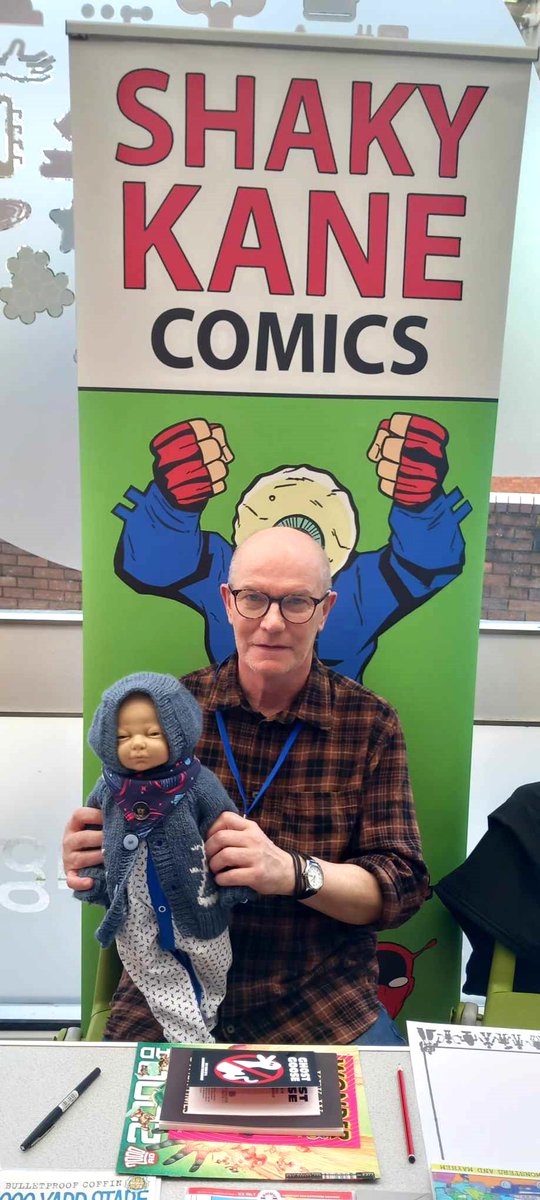 RobinTamblyn's tweet photo. Sadly the Invasion was more micro this year, with no Daleks or Darth Vader ☹️ - still, Adric had fun with @shaky_kane at #TauntonLibrary meeting the fans... #AyrtonandAdric #creepydolls #Invasion4 #Invasion2024 🩺❓ https://t.co/cb1WeGtb1j