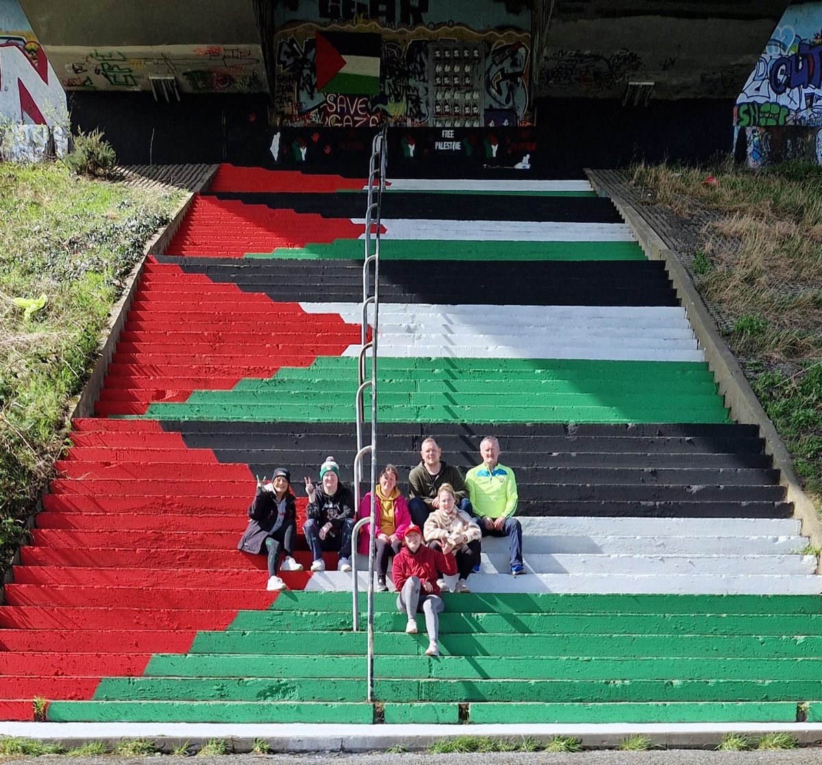 PolDeBuitleir's tweet photo. Under the Foyle Bridge Derry City Ireland steps painted in Palestinian colours in solidarity with the people of Gaza 🇵🇸 https://t.co/bzC6jVXata